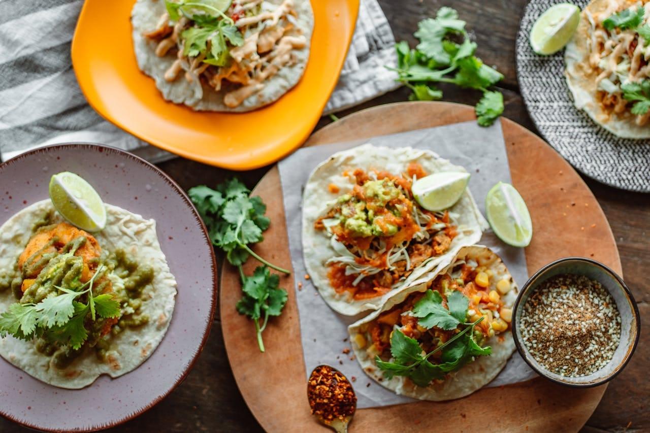 Crispy Fish Tacos with Tangy Slaw and Fresh Lime Wedges